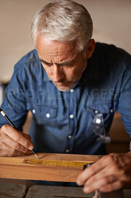 Buy stock photo Carpentry, wood and man with pencil, focus and thinking at designer furniture manufacturing workshop. Creativity, small business and professional carpenter working on design for sustainable project.