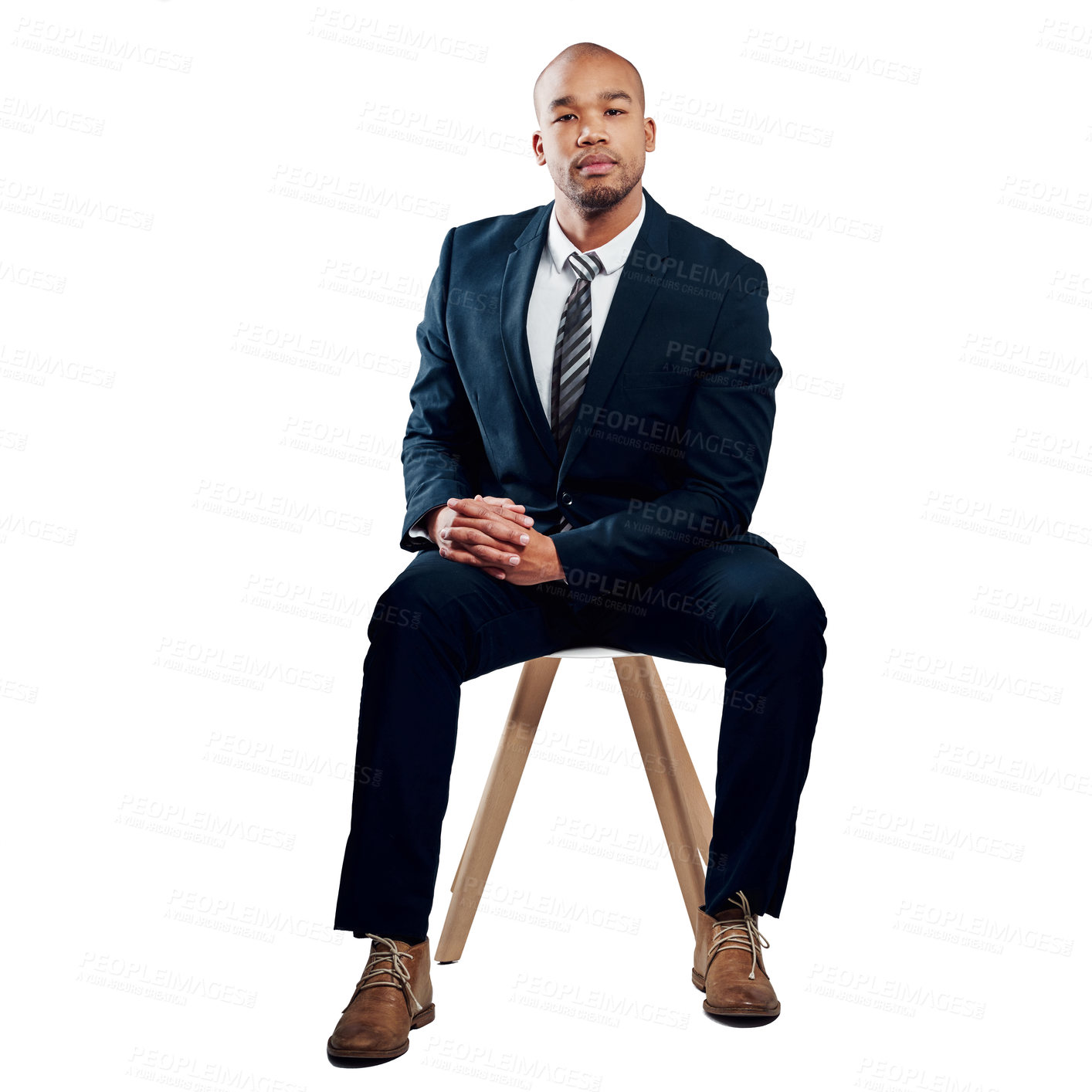 Buy stock photo Studio shot of a handsome young businessman posing against a white background