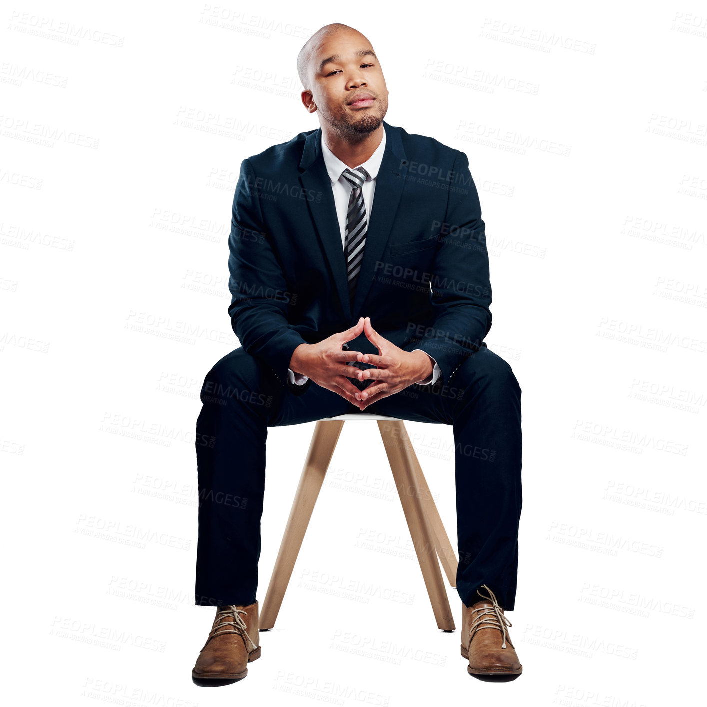 Buy stock photo Studio shot of a handsome young businessman posing against a white background