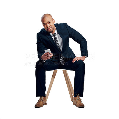 Buy stock photo Studio shot of a handsome young businessman using a cellphone against a white background