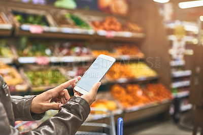 Buy stock photo Person, hands and shopping list at grocery store on smartphone in shelf for food and product. Customer, aisle and supermarket or convenience shop for retail cost, prices and discount or promotion