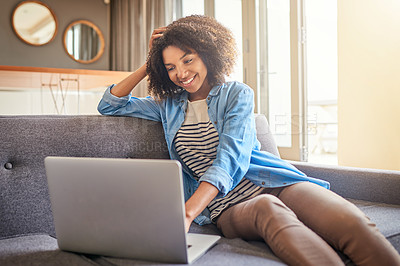 Buy stock photo Technology, black woman with laptop and on sofa of her living room at her home smiling. Social media or connectivity, networking and African female reading an email on her digital device on couch