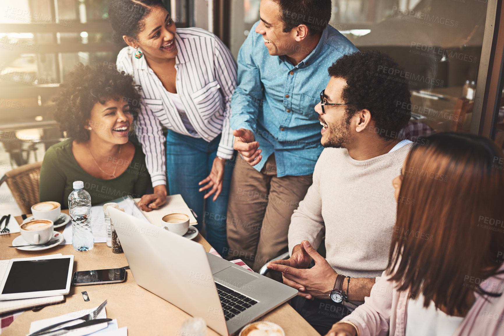 Buy stock photo Business people, laughing and laptop for meeting at coffee shop with startup project development or company website launch. Remote work, team lunch and graphic agency with fun for creative strategy