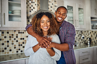 Buy stock photo Love, portrait and hug with couple in kitchen of apartment for bonding, happiness and support. Marriage, commitment and calm with man and woman at home for partner, wellness and trust together