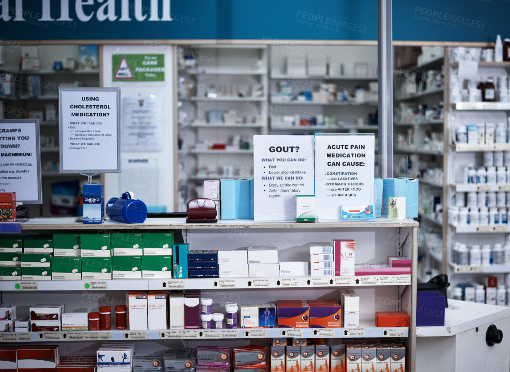 Buy stock photo Shot of shelves stocked with various medicinal products in a pharmacy