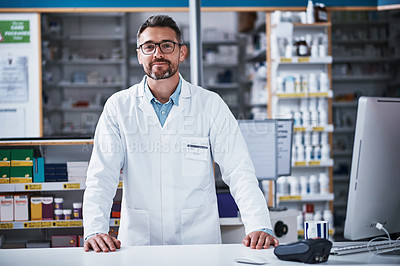 Buy stock photo Portrait of a mature pharmacist working in a pharmacy