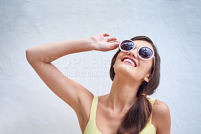 Buy stock photo Wall, woman and smile with sunglasses for fashion, trendy style and thinking with beauty for pride. Female person, happy and lipstick with accessory for sunshine, magazine publication and confidence