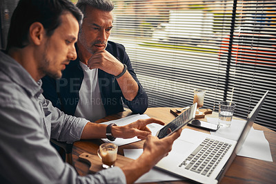 Buy stock photo Shot of businessmen working in the office