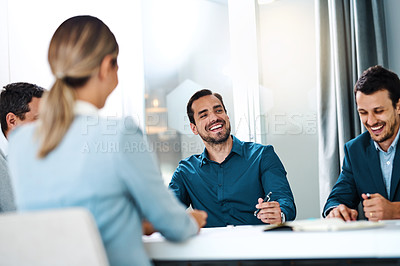 Buy stock photo Shot of a group of businesspeople having a meeting in an office