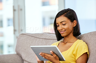 Buy stock photo Indian girl, smile or tablet on sofa in home for social media scroll, internet subscription or online streaming. Gen z, happy person or digital technology on couch for watching video or reading ebook