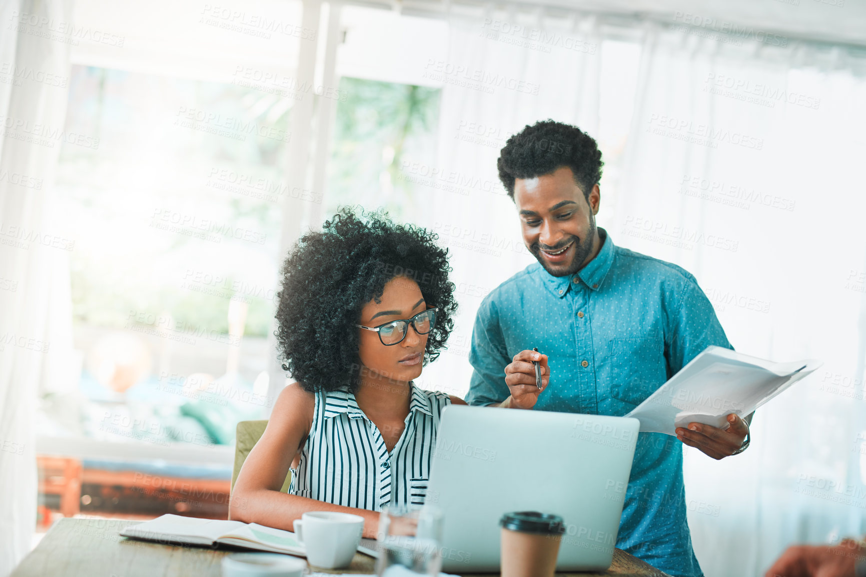 Buy stock photo Shot of young designers working in a modern office