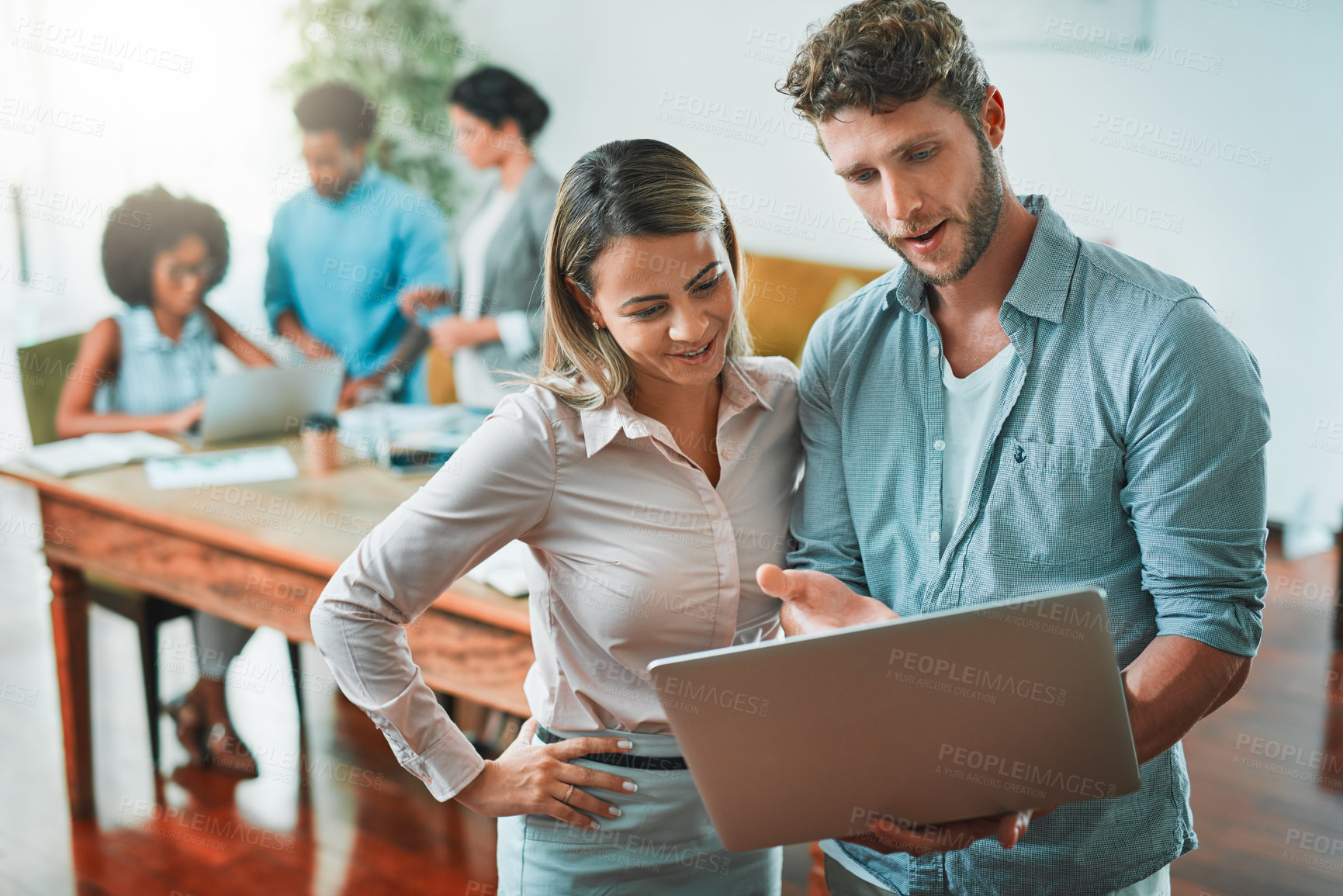 Buy stock photo Shot of young designers working in a modern office