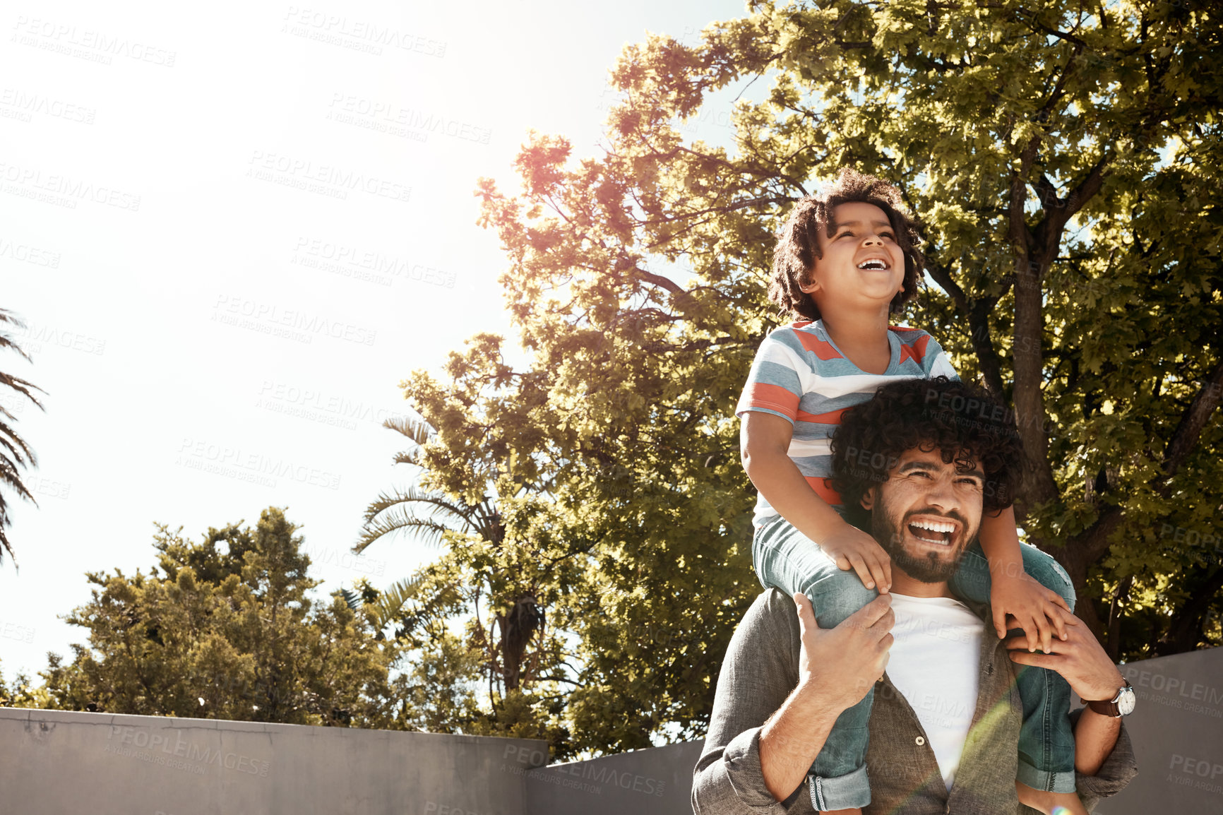 Buy stock photo Happy dad, boy and love with piggyback at backyard on holiday, freedom or bonding together at home. Father with young child, son or little kid with smile on shoulder for weekend in outdoor nature