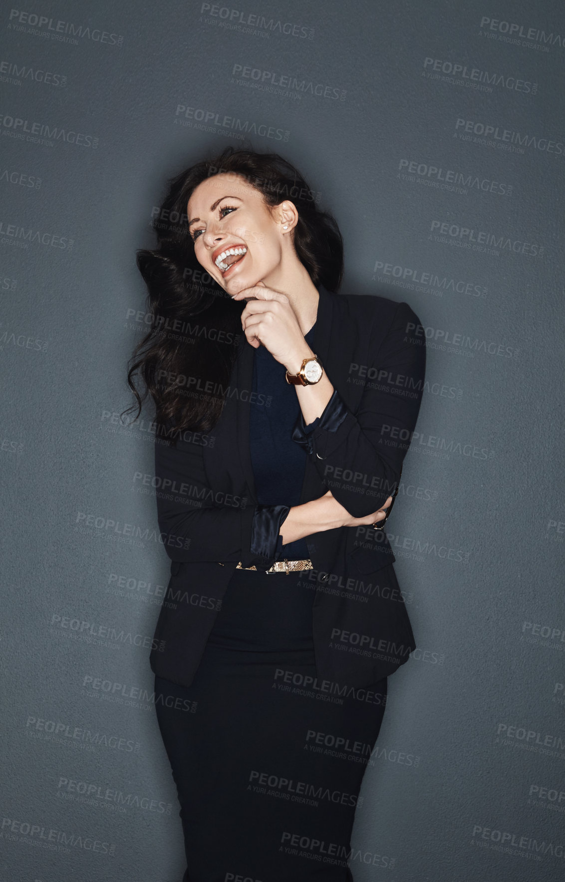 Buy stock photo Studio shot of a young attractive corporate businesswoman posing against a grey background