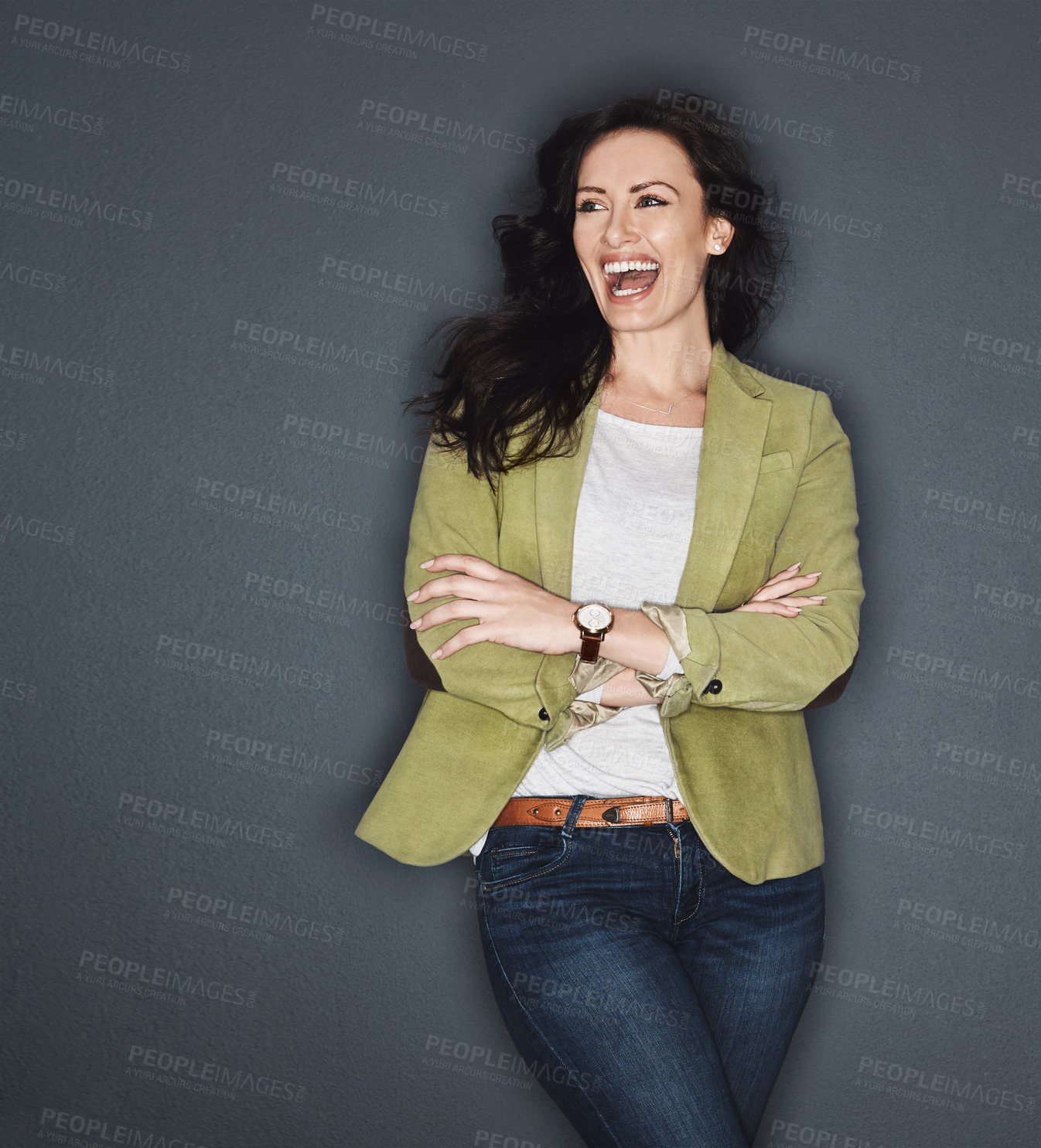 Buy stock photo Studio shot of a young attractive casual businesswoman posing against a grey background