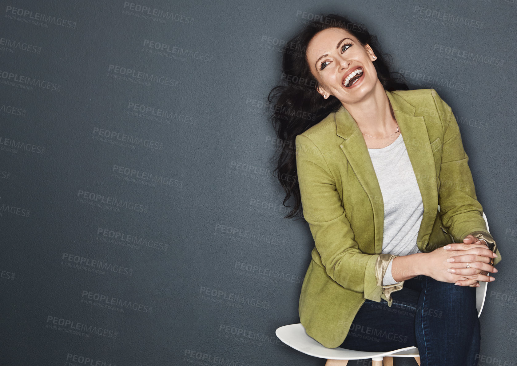 Buy stock photo Studio shot of a young attractive casual businesswoman posing against a grey background