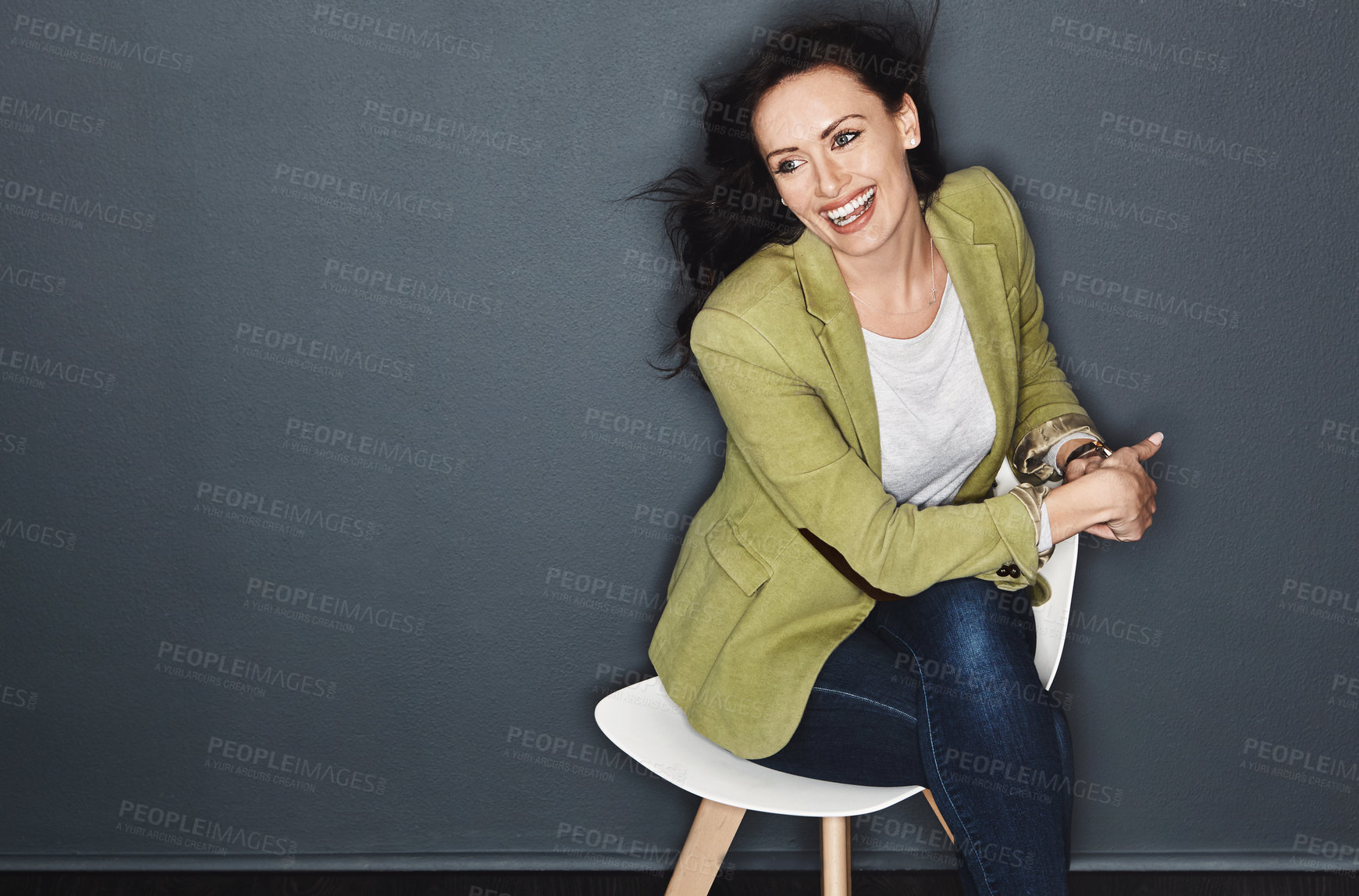 Buy stock photo Studio shot of a young attractive casual businesswoman posing against a grey background