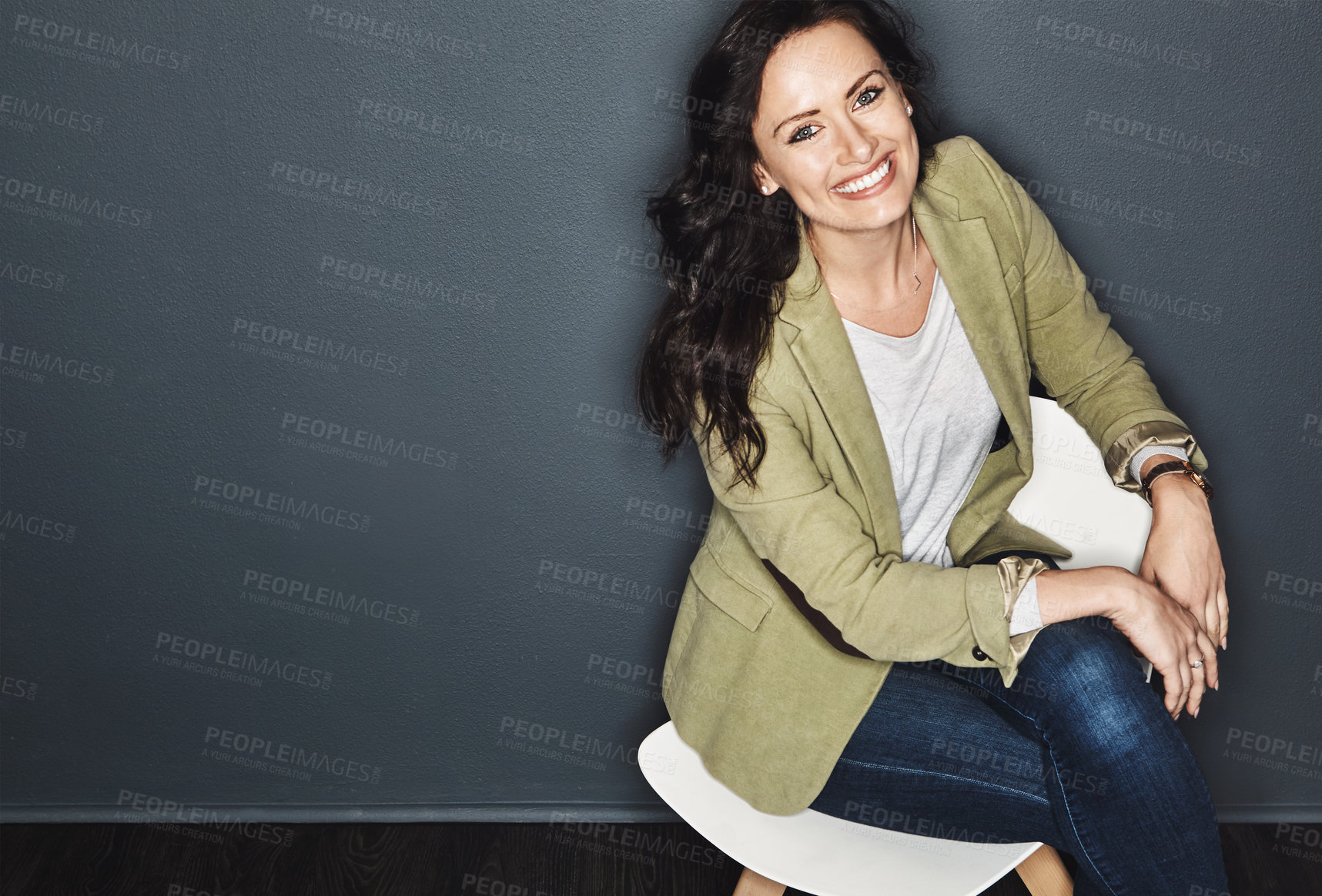 Buy stock photo Studio shot of a young attractive casual businesswoman posing against a grey background