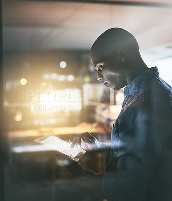 Buy stock photo Black business man, night and tablet with analysis, planning or focus for deadline, research or project. African businessman, digital touchscreen or web design for ux, website or reading in workplace