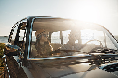 Buy stock photo Couple, beach and happy in car for road trip with view, relax and sunglasses on vacation. Man, woman and love for travel, transportation and journey by sea, adventure holiday or memory in Australia