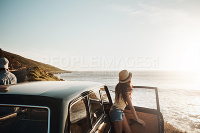 Buy stock photo Car, travel and couple with view at beach for summer vacation, anniversary and sunset in Norway. Holiday, drive and woman by ocean on road trip for tourism, romantic adventure and outdoor sightseeing