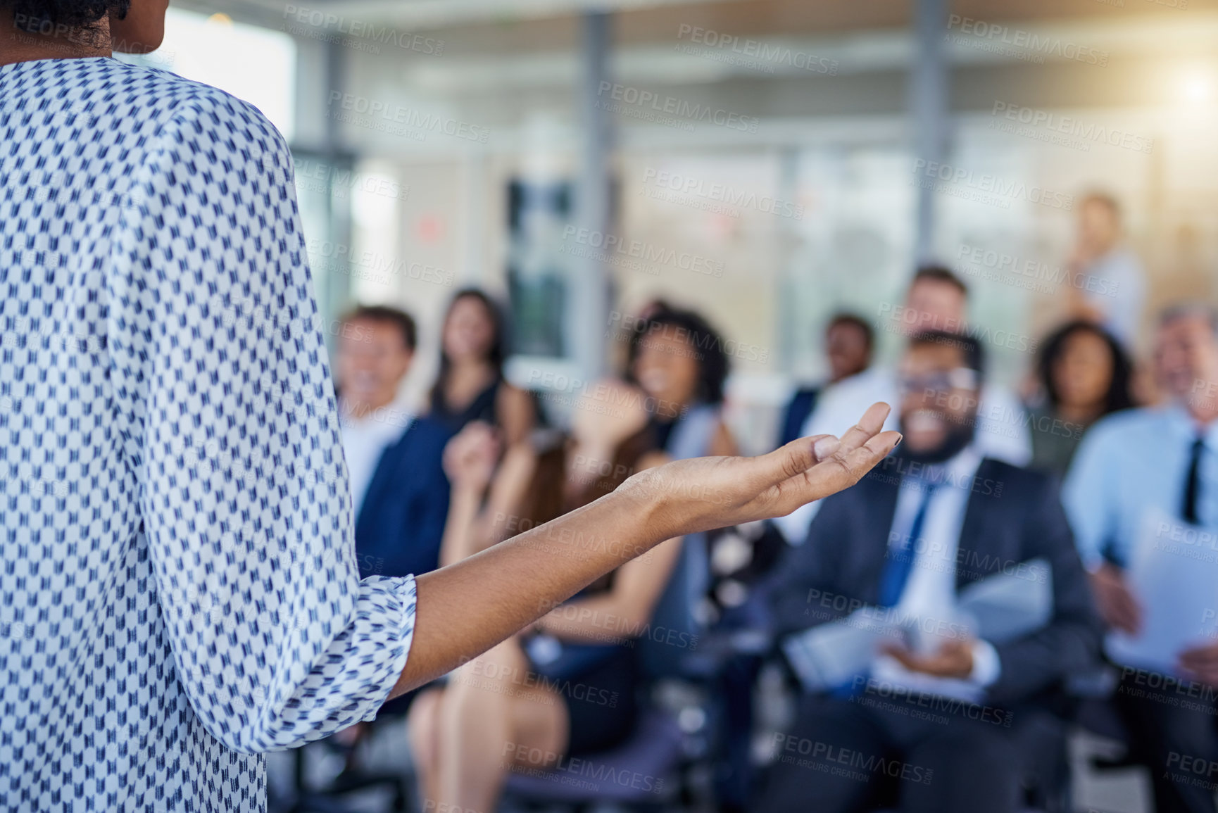 Buy stock photo Presentation, hand and a woman as speaker at a conference for training or workshop. Business, corporate and a female manager speaking to a crowd at a seminar or convention for leadership or mentoring