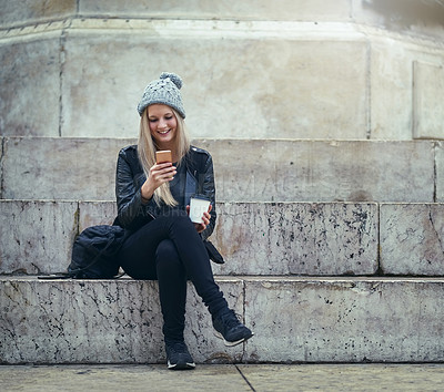 Buy stock photo Coffee, city or happy woman on steps with mobile app on social media, internet or blogging for fashion tips. Urban town, beverage or trendy girl online to search cool clothes with phone or texting