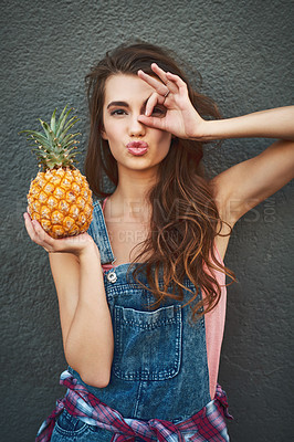 Buy stock photo Girl, portrait and pineapple with funny face outdoor for summer fruit, healthy food and okay gesture for nutrition. Woman, person and hand emoji on gray background with organic diet approval and pout