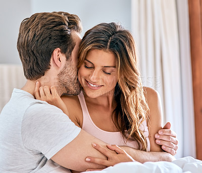 Buy stock photo Couple, kiss and smile together in bed for rest, relax and hug with marriage affection and morning love in home. Happy, man and woman with peace in house, bedroom and domestic comfort with partner