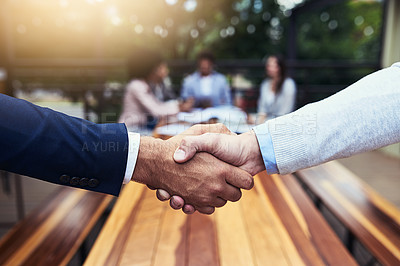 Buy stock photo Business people, handshake and meeting with team in boardroom for deal, agreement or partnership at office. Employees shaking hands for b2b, collaboration or trust in group discussion at workplace