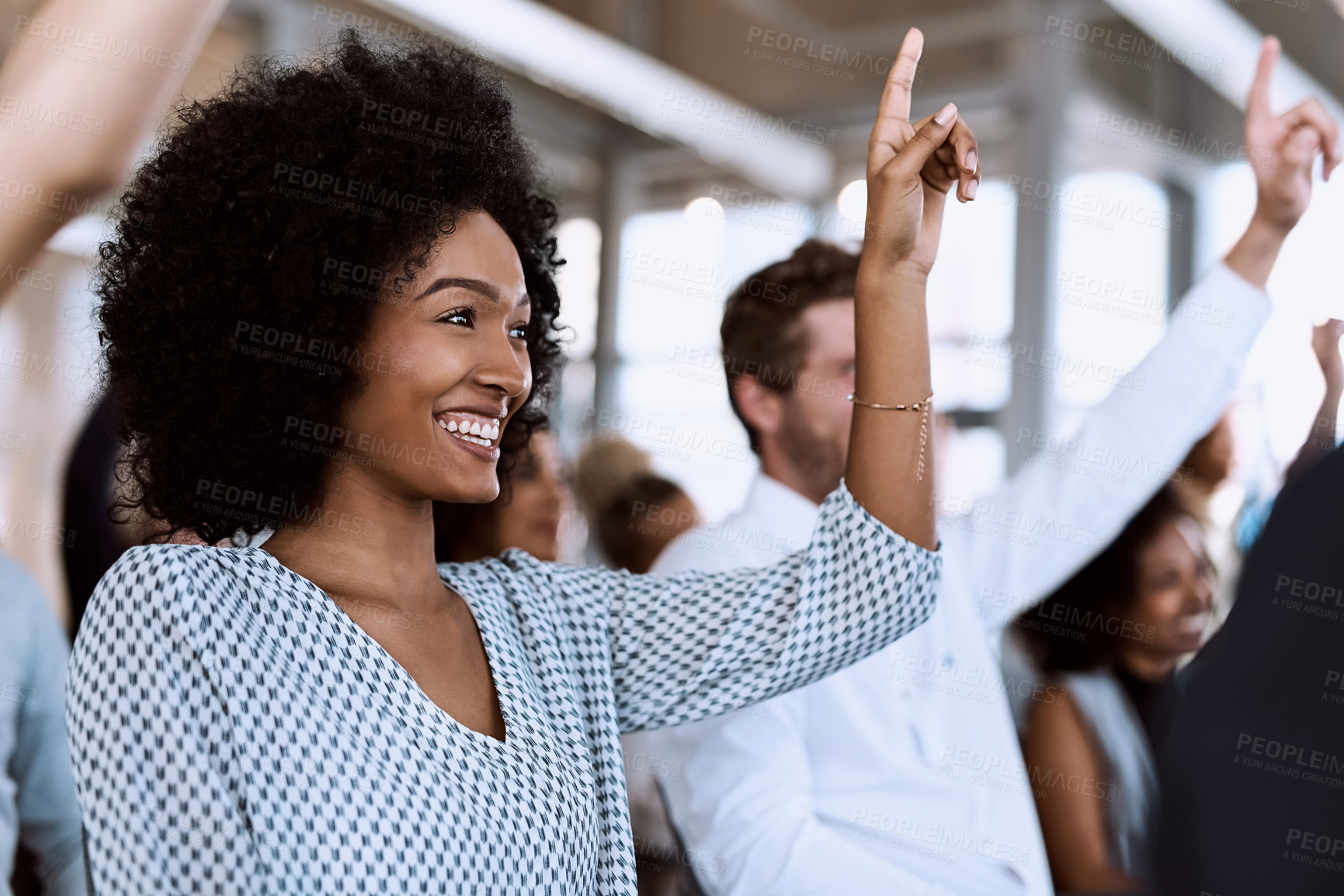 Buy stock photo Shot of a group of businesspeople raising their hands to ask questions during a conference