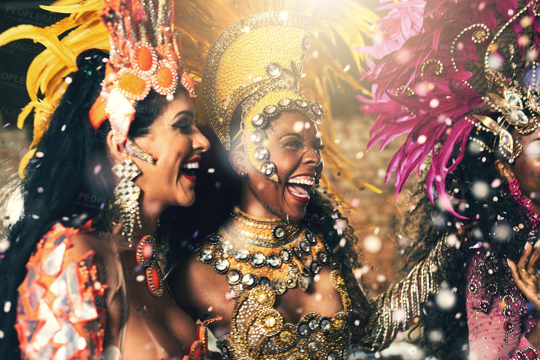 Buy stock photo Women, samba and dancers hugging and bonding in costume before a carnival celebration. Party, festival and group of ladies in creative outfits in Rio de Janeiro for artist or artistic performance 
