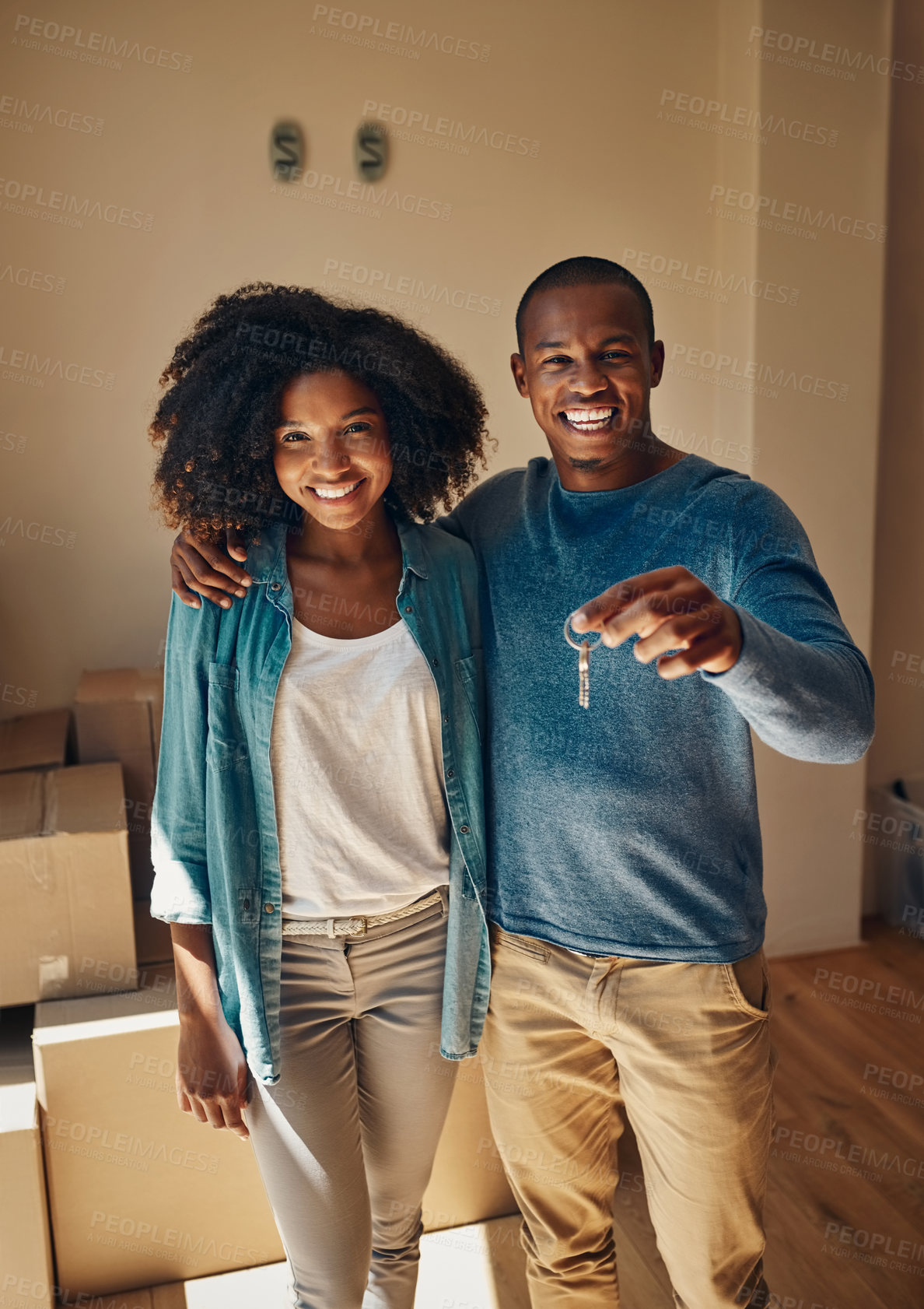 Buy stock photo Hug, keys and portrait of black couple in new home with box goods in living room for real estate investment. Love, property or smile with happy man and woman in apartment for growth or mortgage