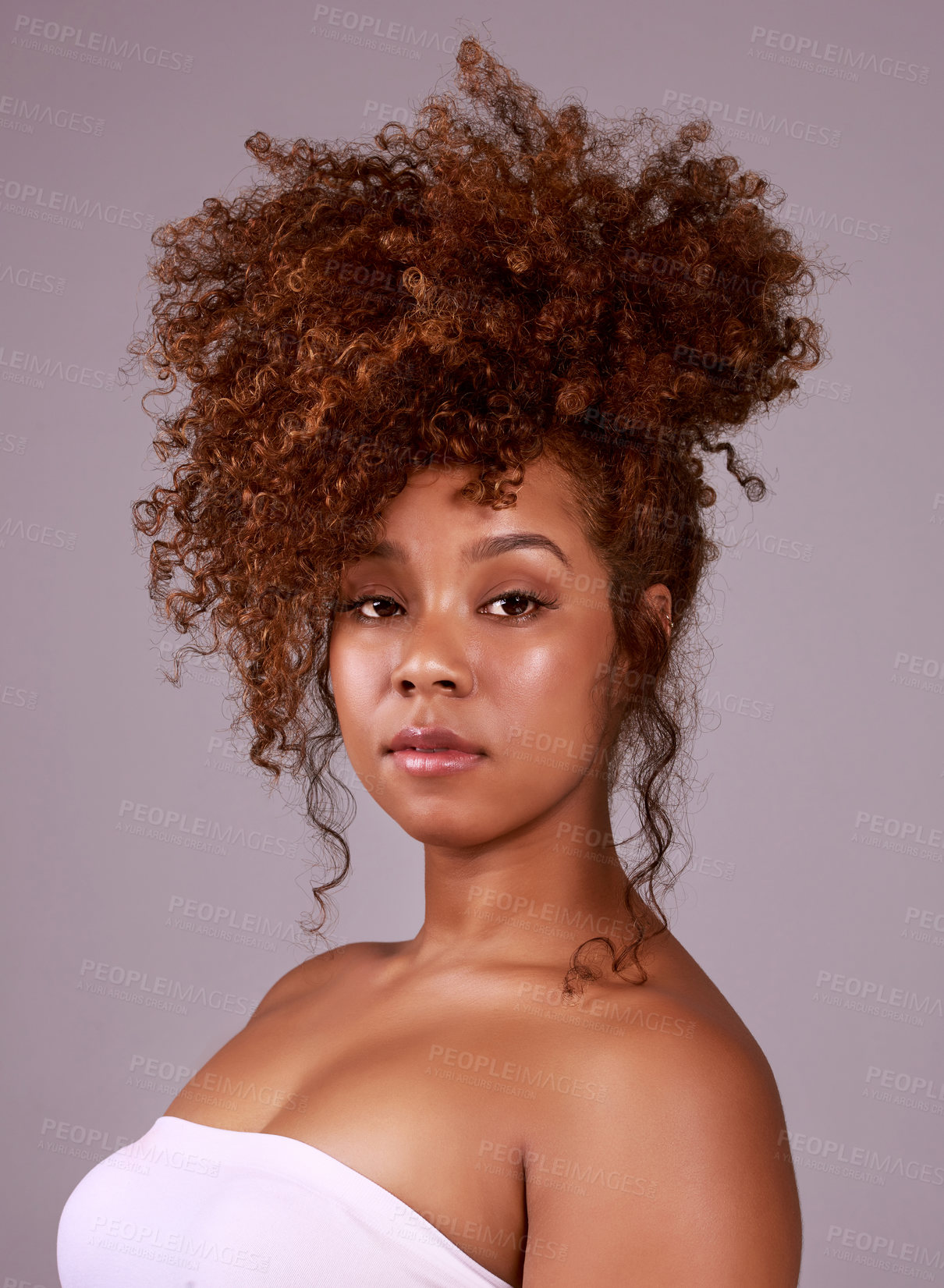 Buy stock photo Curls, hairstyle and portrait of black woman with confidence, pride and elegant salon hair care. Natural haircare, afro and style on female model with growth, keratin and treatment on gray background