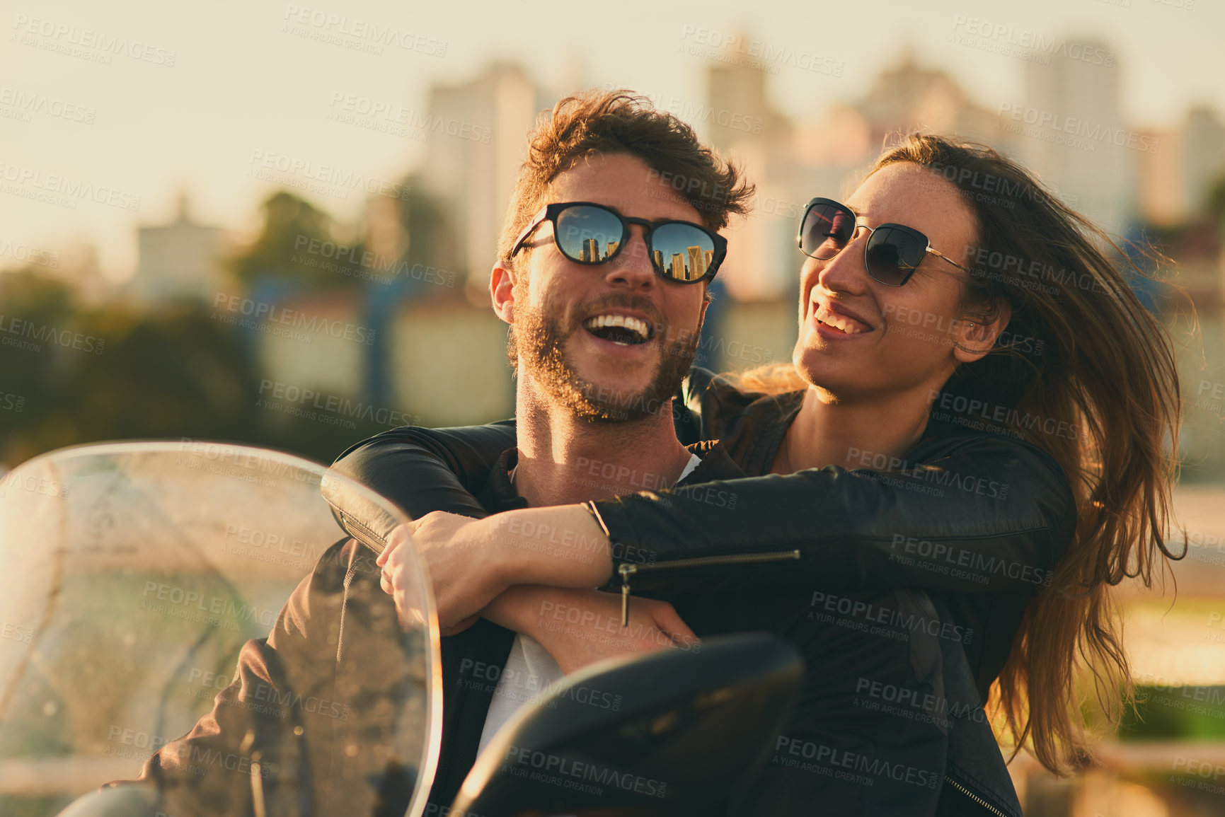 Buy stock photo City, happy couple and riding with scooter for travel, adventure and connection with hug outdoor. Relationship, man and woman with sunglasses on vacation, bonding and motorbike for transportation