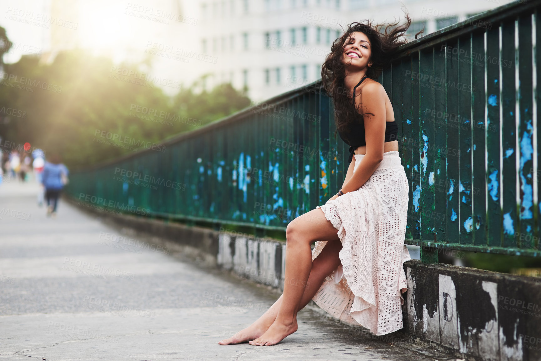 Buy stock photo Portrait of an attractive young woman out in the city