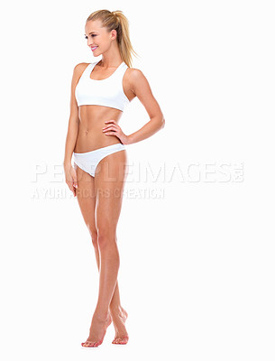 Buy stock photo Studio shot of a young attractive woman posing against a white background