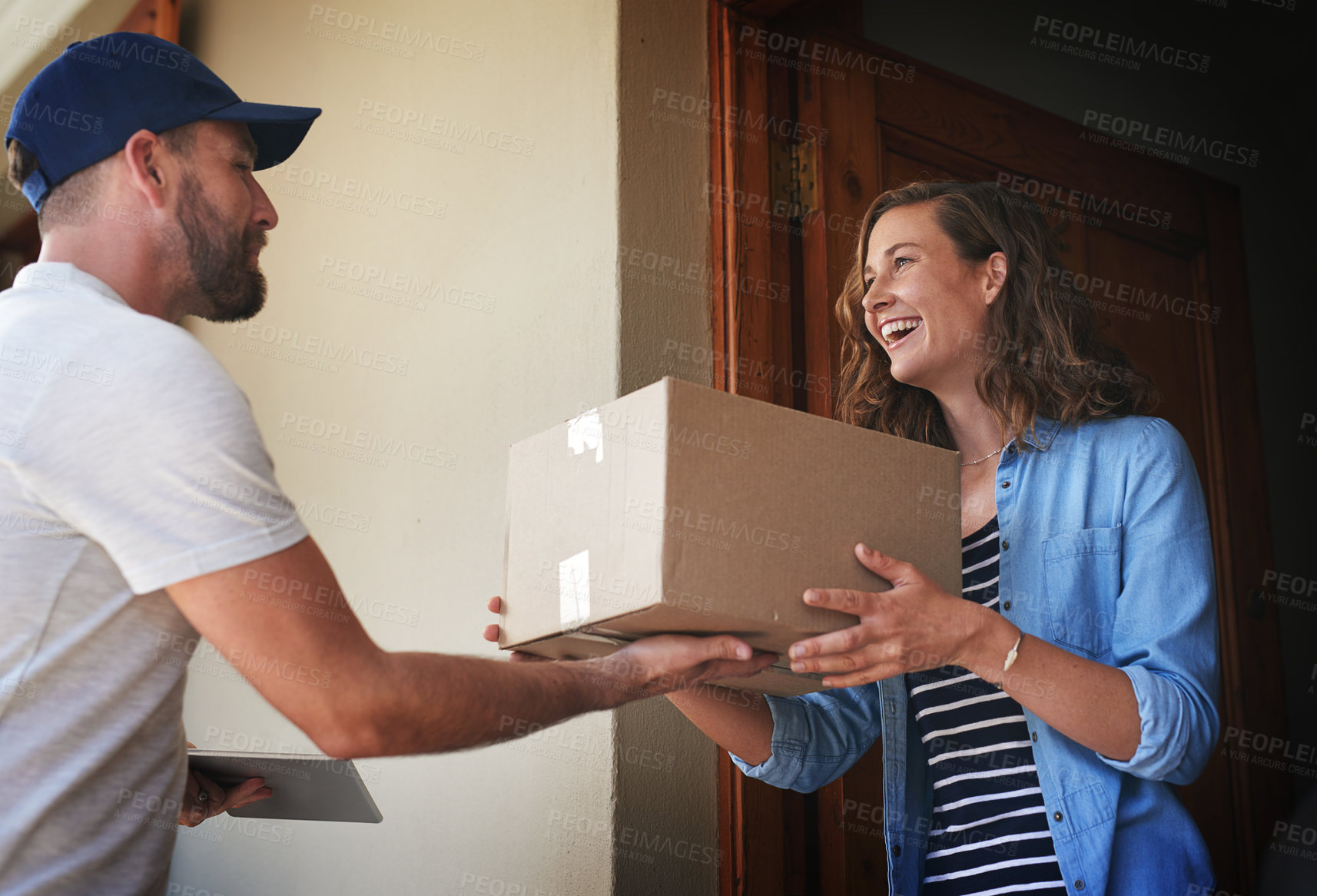 Buy stock photo Happy woman, delivery man and package box at door for order, parcel or cargo of customer in transport service. Female person receiving shipment from male courier, supply chain or deliver at the house