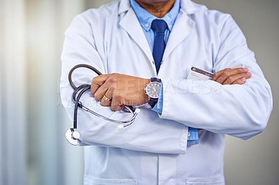 Buy stock photo Man, doctor and hands with stethoscope in confidence for cardiology, heart professional or healthcare at hospital. Closeup, male person or cardiologist with health tool and arms crossed at clinic