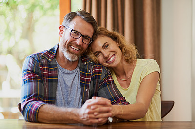 Buy stock photo Cropped shot of a mature married couple being affectionate at home