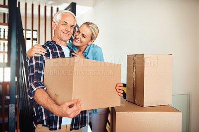 Buy stock photo Couple, boxes and new house with portrait for real estate property and mortgage or bond approval. Happy mature man and woman with hug, love and support or help with moving into home in Arizona, USA