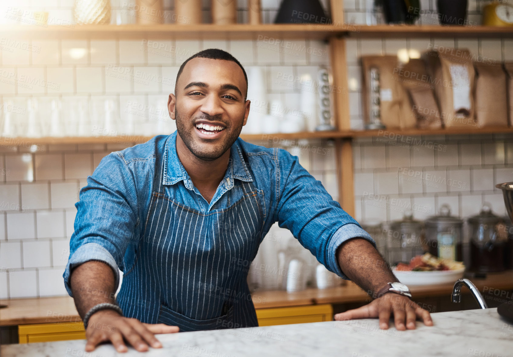 Buy stock photo Coffee shop, barista and happy portrait of black man in restaurant for service, working and welcome in cafe. Small business owner, bistro startup and male entrepreneur smile by counter ready to serve