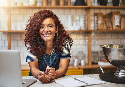Buy stock photo Cropped portrait of an attractive young woman working in her coffee shop