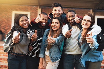 Buy stock photo Portrait of a group of students giving thumbs up together on campus