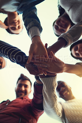 Buy stock photo Hands, huddle and solidarity with people outdoor from below on sky for celebration, motivation or support. Circle, palm and unity with group of friends together for community, partnership or trust