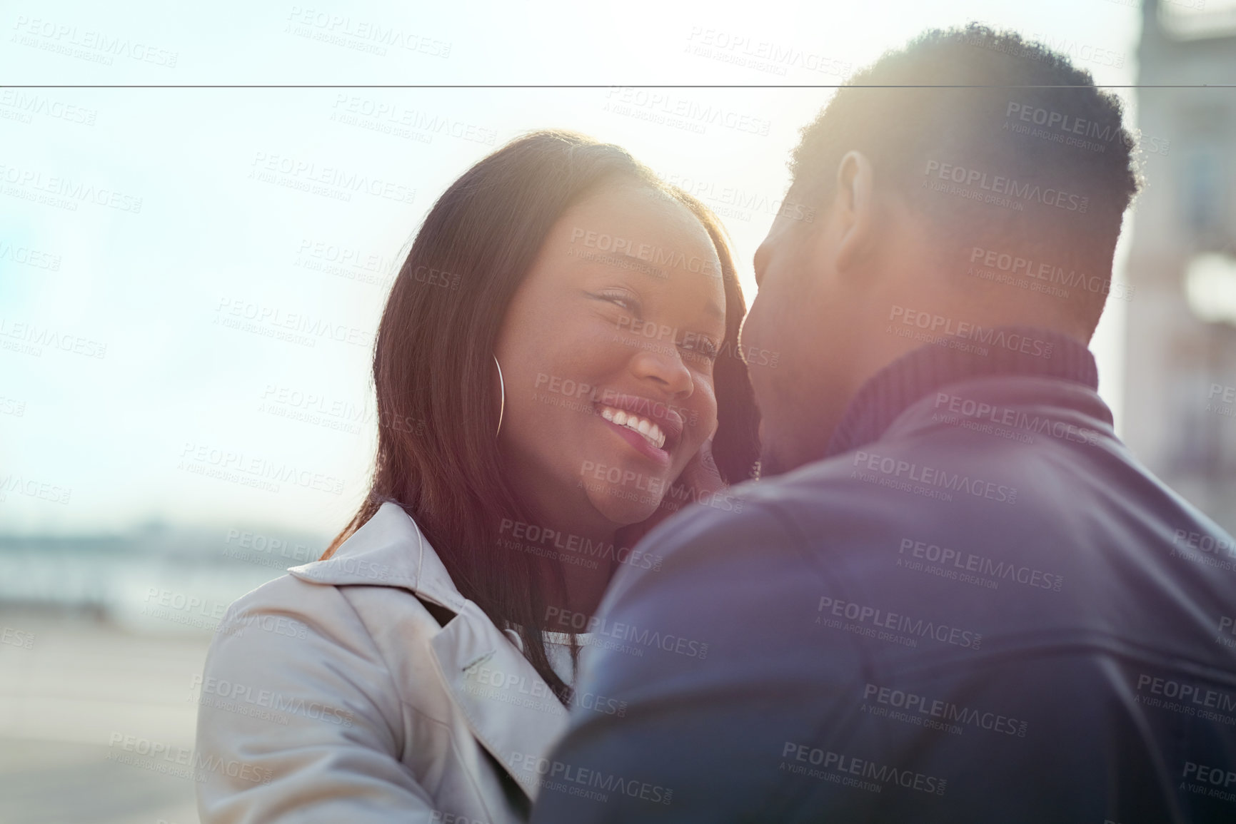 Buy stock photo Couple, affection and bonding in the city in a loving, caring relationship while on a romantic date. Intimate moment, african american man and woman dating in an urban town with love and care