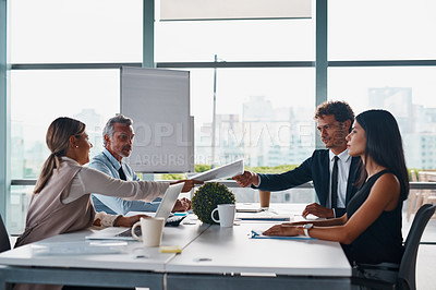 Buy stock photo Cropped shot of corporate businesspeople having a meeting in the boardroom