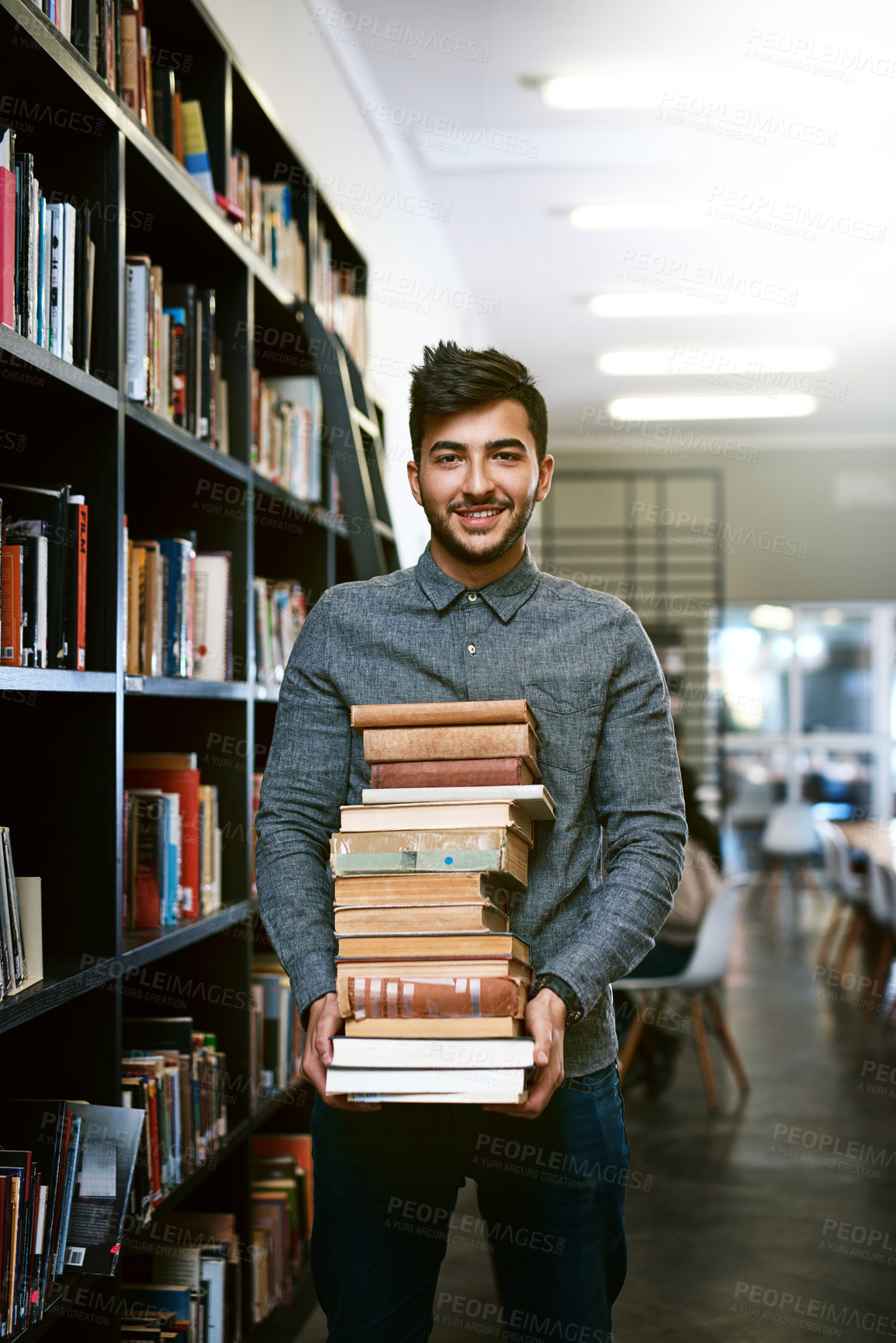 Buy stock photo Portrait, librarian or happy man with book in library with smile for education, opportunity or studying at college. Packing, shelf or student for research, knowledge and school service at university