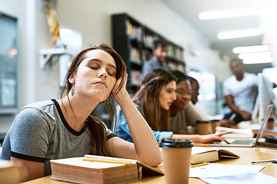 Buy stock photo Woman, tired and books for studying at library, college or campus with stress, anxiety or burnout. University student, girl and headache with education, study and fatigue on face at school with sleep