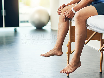Buy stock photo Physiotherapy, leg pain and medical with man in room for consulting, medical and training. Rehabilitation, muscle and injury with closeup of senior patient in clinic for physical therapy and healing